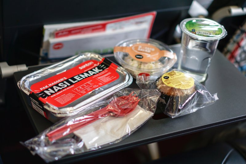 Many inflight meals are still wrapped in plastics because they are cheap, light, and can lessen the chance of contamination