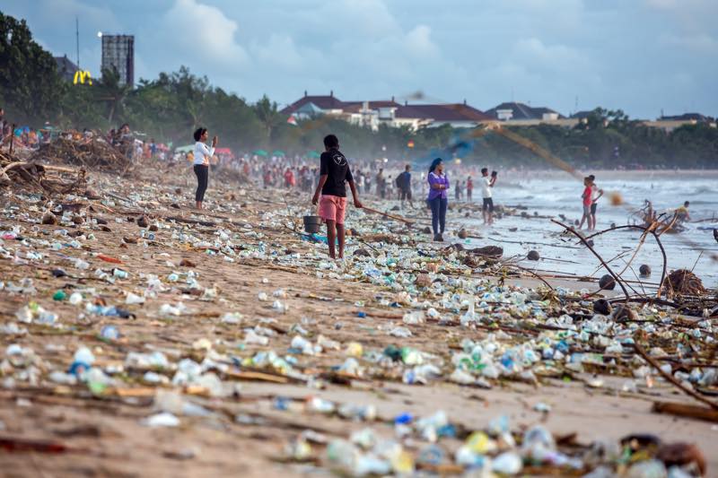 Kuta beach in Bali is covered with plastic debris after a storm